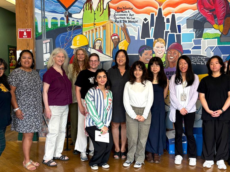 Two tradeswomen on a job site.