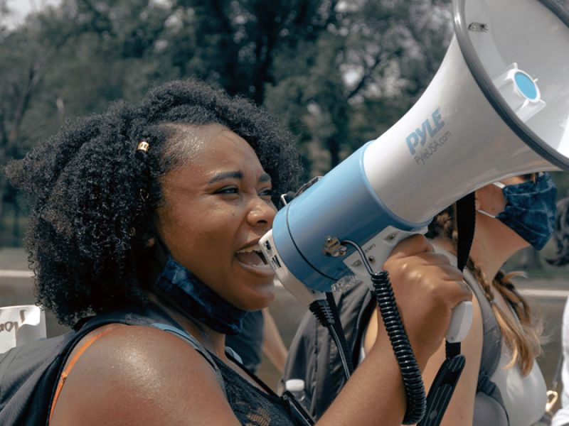Woman with bullhorn